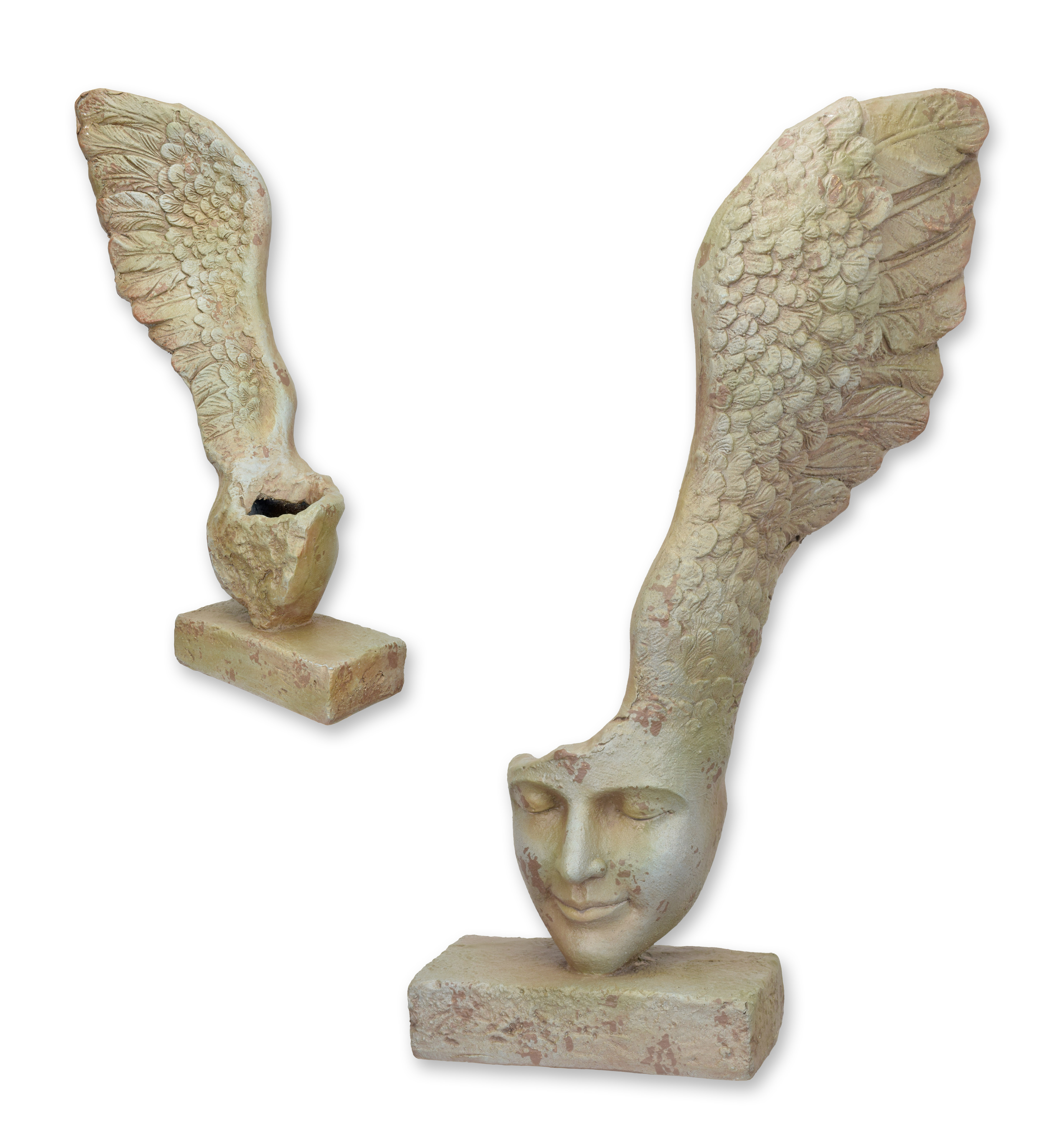 Una fioriera con ali in stile antico in mgo replica design retrò decorazione